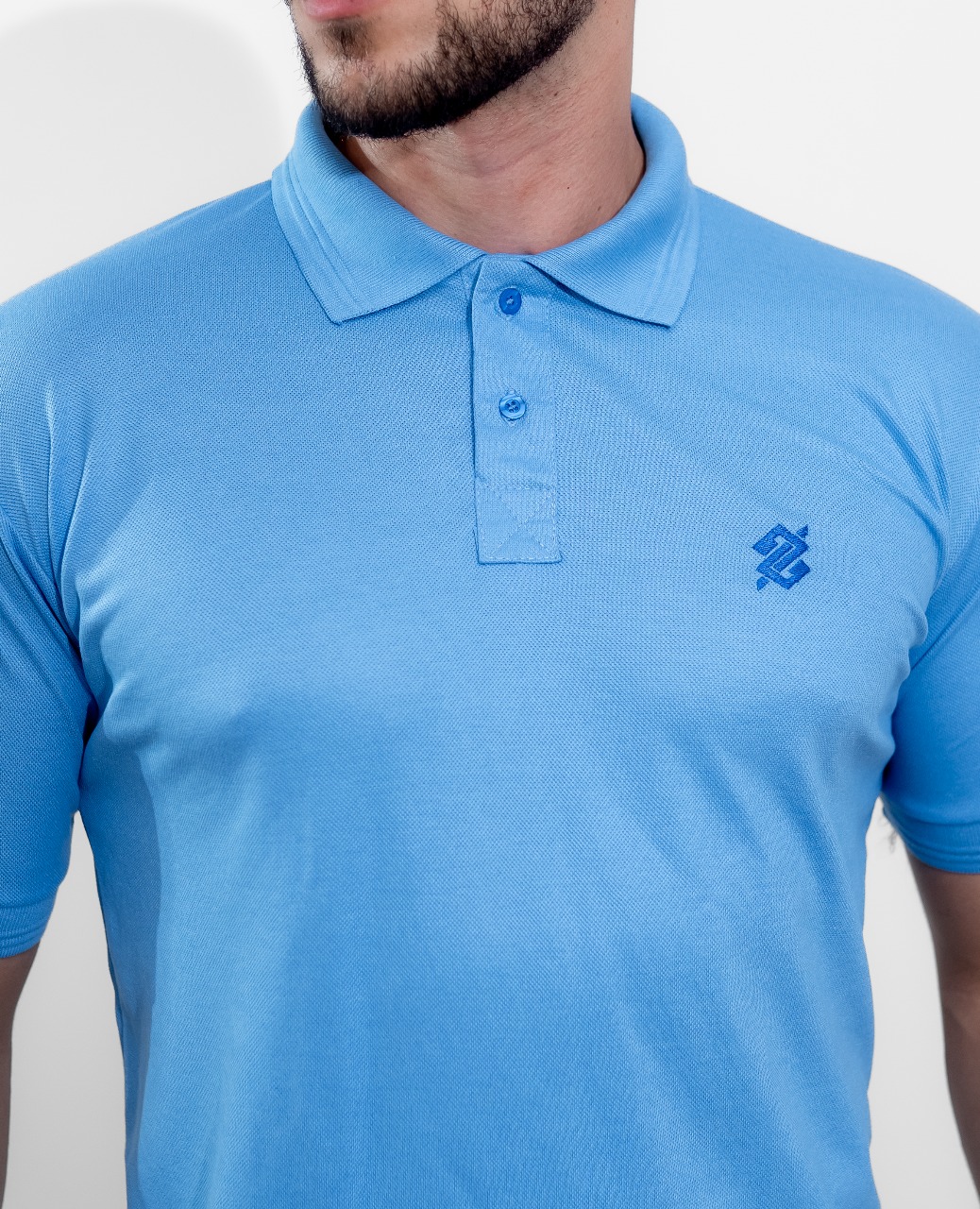 Camiseta Polo Banco do Brasil na cor Azul Etna com símbolo bordado na cor Azul - Imagem 2